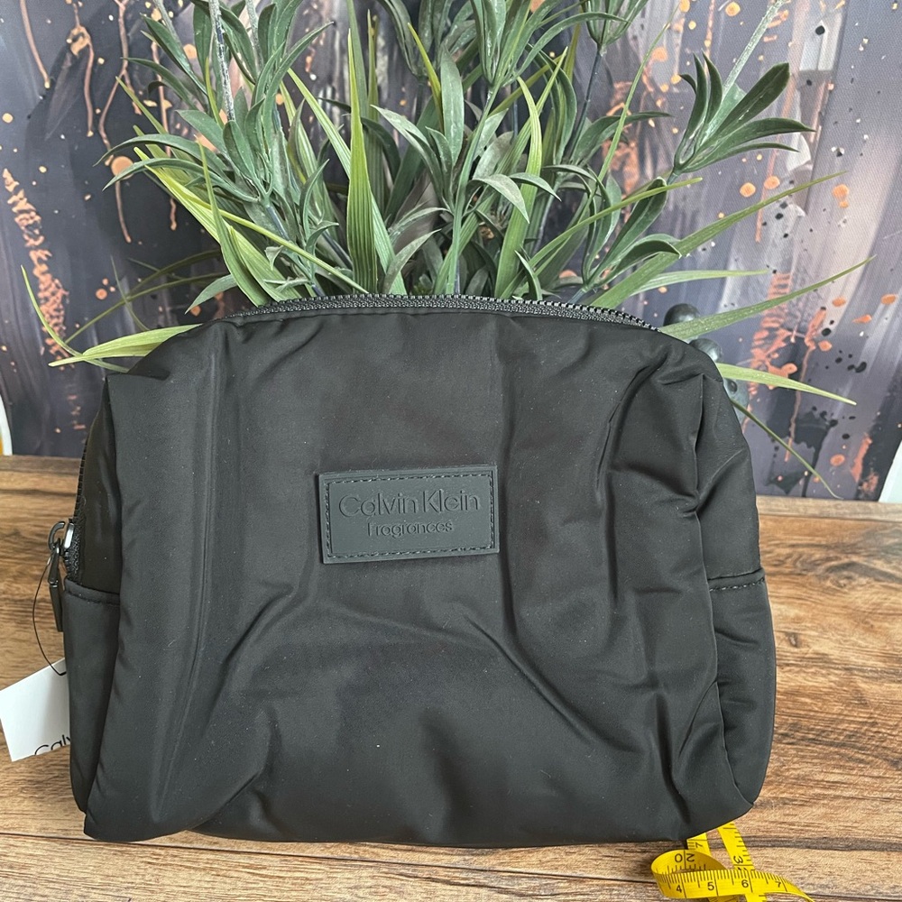 Calvin Klein Black cosmetic Men's Bag .